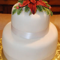 Christmas Engagement Simple Christmas engagement party. I used MMF and decorated with ribbon and gumpaste pointsettia.