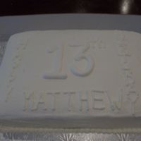 White On White Birthday Strawberry cake with strawberry filling white buttercream frosting.