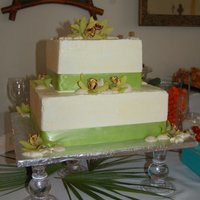 Wedding Cake This is a yellow cake with meringue buttercream and white chocolate shells