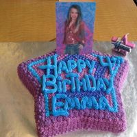 Hannah Montana Star Strawberry cake, strawberry filling, covered in BC stars. The pic was one I found on a gift bag. It changed when you moved it from Hannah...