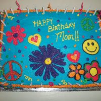 Retro Flower Power Cake A cake that I made for my mom. All buttercream frosting. I attempted a BCFT but it didn't work so well so I went back to my stars!
