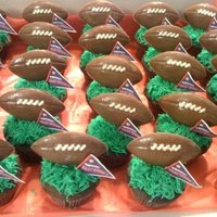 Football Cupcakes Chocolate cupcakes, vanilla buttercream, handmade milk chocolate footballs