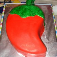 Chili Pepper This cake is covered with satin ice fondant. Its is two 2inch thick cakes.Made with the new comma shaped pans. Chocolate and french vanilla...