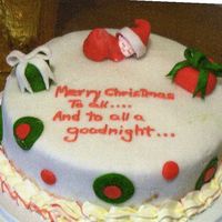 File0014.jpg This was the first cake I have ever used fondont on.It wasn't perfect but I think it is cute.