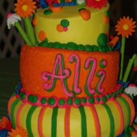 Bright 13Th Birthday Cake 3 tiered cake topped with 3D funky flowers and some hot colors to accent