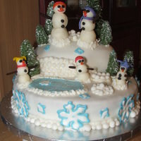 Winter Fun... vanilla cake with BC center, MMF, color flow snowflakes, snowballs are MMF,little pond is MMF colored blue with edible sprinkles, trees and...