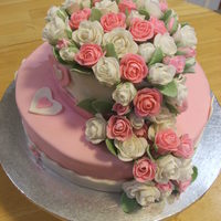 Rose/heart Cake For my advanced cake decorating class....Funetti cake base, and chocolate top, with a BC center, covered by MMF, hearts, roses and leaves...