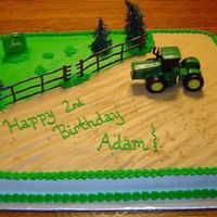 John Deere Cake All buttercream icing except for the figures on top.