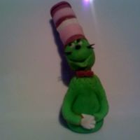 Dr. Suess This is a gumpaste model of Dr. Suess, multicolored. I did this figure for a friends birthday to top a yellow cake covered in fondant. The...