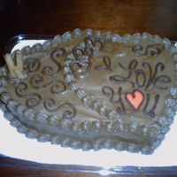 My First Valentine's Day Cake Order Customer's wife loves Chocolate & Coffee. Words & Hearts were made with melted Semisweet Chocolate. Wafers were Cappuccino...