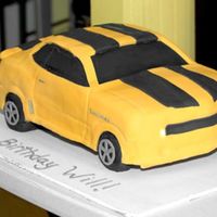 Bumblebee Camaro I made this cake for a 4 year olds b-day. It def did NOT turn out the way I wanted it but I am continuing to learn new ways of doing the 3-...