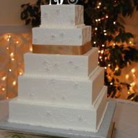 Hand Piped Embroidery I did this cake to replicate the brides dress. It was my very first cake in my new shop and I was up until 2:00am the night before getting...