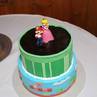 Super Mario Grooms Cake This is one of those cakes were all I could see were my mistakes! But when I heard the feed back from the reception aparently the guests...