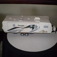 Travel Trailer Groom's Cake This is a groom's cake for a groom who is a plant manager for Forest River. The trailer actually had 2 different designs (the plant...