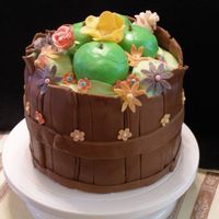 Barrel Of Apples & Flowers Inspired by pictures from YouTakeTheCake and Cakegirl0315. It is a WASC with buttercream and cover in chocolate MMF. Flowers are all...