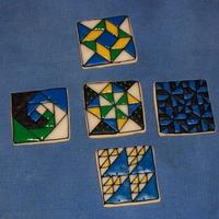 Quilt Blocks! I got a new square cookie cutter, so I decided to do some quilt blocks! NFSC with colored glace. Top: Windblown square. Middle row: Snail...