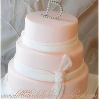 Pink Sash Cake This was another of the cakes I did for a Bridal Show. Inspired by a pink cake box design :) The cake was supposed to be ivory, but when i...