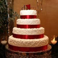 4 Tier Scroll Cake This cake was a challenge for me- first time with scrolls. I was very happy with the end result, and think my success was due to two facts...