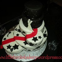 Black And White With Red Carpet This cake was super fun to make!! I couldn't picture it at all until it was fully assembled, so I was very anxious until the last...