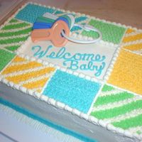 Baby Shower Quilt Cake This one is pre-decorating class. Nine by thirteen cake for a friend's baby shower at the office. Chocolate cake with BC frosting. The...