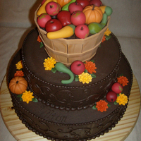 Fall Harvest Cake Stacked cake created for my first decorating contest. (Didn't win, but had a great time!) 6,10,&14 inch tiers frosted in dark...