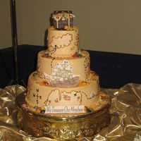 Boween & Lisams Knock-Off Buttercream iced cake with buttercream map, chocolate chest with fondant jewels, pearls, and coins. Experimented some with hard candy and...