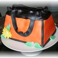 Orange/brown Purse Made for a Ladie's purse, shoes and jewelry "get-together" a neighbor was having. She was so impressed with the cake that...