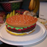 Hamburger Cake Easy to make and always a big hit! Bun is yellow cake and hamburger is chocolate cake. Use buttercream for condiments - mayo, ketchup,...