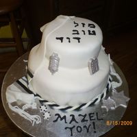 Matthew's Bar Mitzvah This is a cake I made for a friend's son's bar mitzvah. It is all made from fondant.