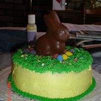 Easter_Cake_2_2.jpg My 2nd cake! Lemon cake, lemon filling and lemon BC. I used a Godiva bunny and Cadbury eggs for the decorations. I was so happy with how it...