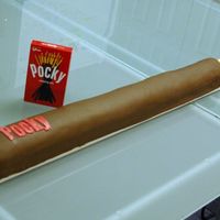 Giant Pocky This was for a co-worker's birthday who loves the Japanese cookie sticks called Pocky. It was only my third fondant cake and my first...