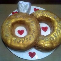 Bandofgold.jpg 8 year anniversary cake...two gold rings