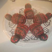 New_Spiders.jpg My little girl, 3 years old, helped me with these spiders. We made them from left overs of a spiderman cake. Once finished and she had a...