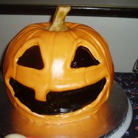 Jack-O-Lantern I made this cake for our annual Halloween party. Many of my guests thought it was a plastic pumpkin!