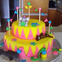 Girly Circus Cake! I was inspired by a CC member...dont know which one exactly...but thank you!!! They really wanted bright colors and to tie in animals with...