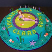 The Mermaid Oh I tell you guys I LOVE this cake. It was so pretty with the colours and I enjoyed so much doing something different than fairies! I know...