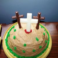 Calvary Cake Angel food cake, buttercream/ cool whip icing. Crosses made out of milk and white chocolate. So much fun to make.