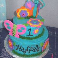 Hannah's 1St Birthday Butterfly Cake Whipped icing, melted in the hot sun :( Gumpaste decorations.