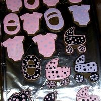 Baby Shower Cookies Chocolate sugar cookies with RI. These were very last minute and delivered still a little wet, but I'm happy with the black ones......