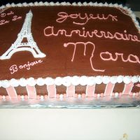French Theme Birthday It is a French Theme Birthday cake. Chocalate Buttercream, the Eiffel Tower is done in royal icing.