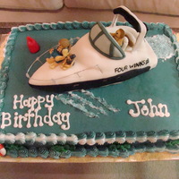 Boat Cake This was a replica of the client's boat with their family on the boat. Boat is rice cereal treats covered in fondant.