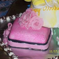 Pink And Black Fancy Roses are Starbursts. Cake MMF with sponged on Royal Icing.