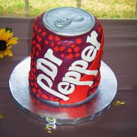 Dr. Pepper Cake Dr. Pepper grooms cake. 2 6" stacked cakes covered in fondant. Hand cut the letters.