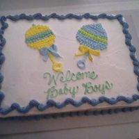 Rattles Made this cake for baby shower for someone at my mom's work. The rattles were free-hand and I like the yellow one much better than the...