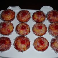 Coconut Muffins Coconut Muffins pasted with strawberry jam and rolled in coconut flakes. I also filled the middle of the muffin with strawberry jam. Oh so...