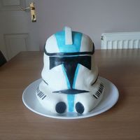 Captain Rex, Stormtrooper Vanilla sponge with raspberry jam and buttercream layered. Iced in fondant. Made for BILs birthday.