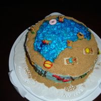 A Day At The Beach This cake was inspired by Woman's Day Magazine. I had colored gold fish and fruit roll ups as the sea weed all around the cake. There...