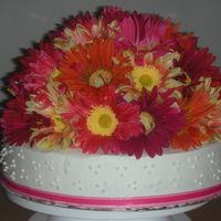 Bridal Shower Cake Daisies white cake with buttercream frosting. gerbera daisies on top