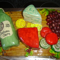 Cheeseboard Cake Made for a friends 50th Birthday. Butter cake with boysenberry filling, covered with chocolate ganache as a crumb coat . Everything made...