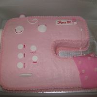 Sewing Machine Cake I made this for my mother inlaws 80th Birthday. It was a real hit.